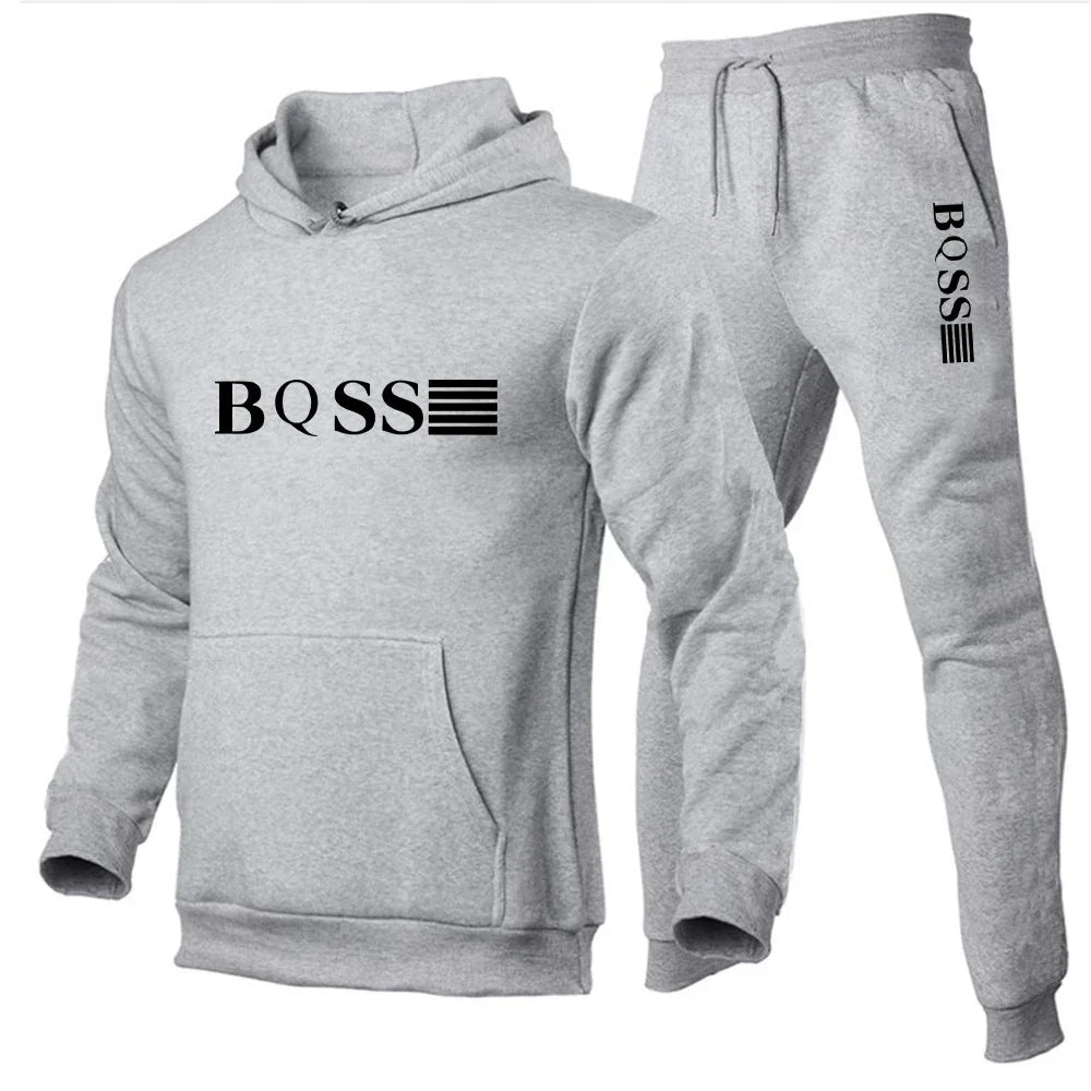 Black hoodie and pants set with 'BOSS' logo on a white background
