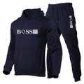 Navy tracksuit with 'BOSS' logo on a white background