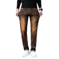 Brown jeans worn by a person on a white background