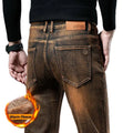 Brown jeans with warm fleece lining feature on a white background