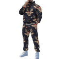 Person wearing a navy blue hoodie and pants set with reindeer pattern on a white background