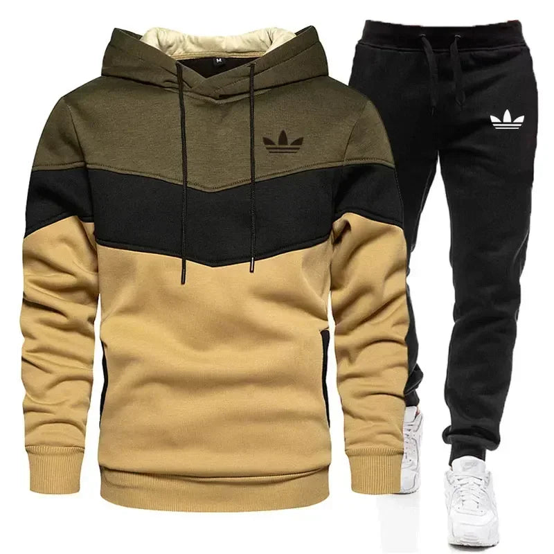 Adidas tracksuit with hoodie and pants on a white background