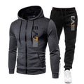 Gray hoodie and black pants with brand logo on a white background