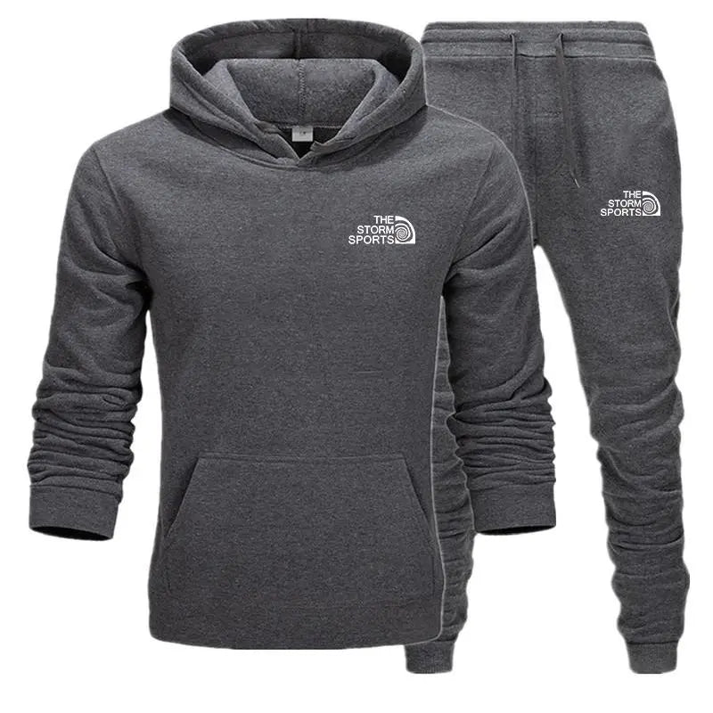 Gray hoodie and pants set with 'The Storm Sports' logo on a white background