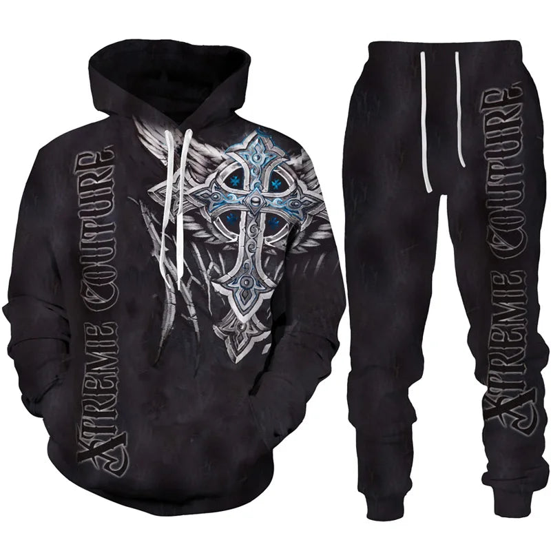 Black hoodie and pants set with intricate design and 'Xtreme Couture' branding on a white background.