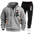 Gray hoodie and black pants with Fila logo on a white background