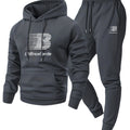 Dark gray hoodie and jogger set with a brand logo on a light gray background