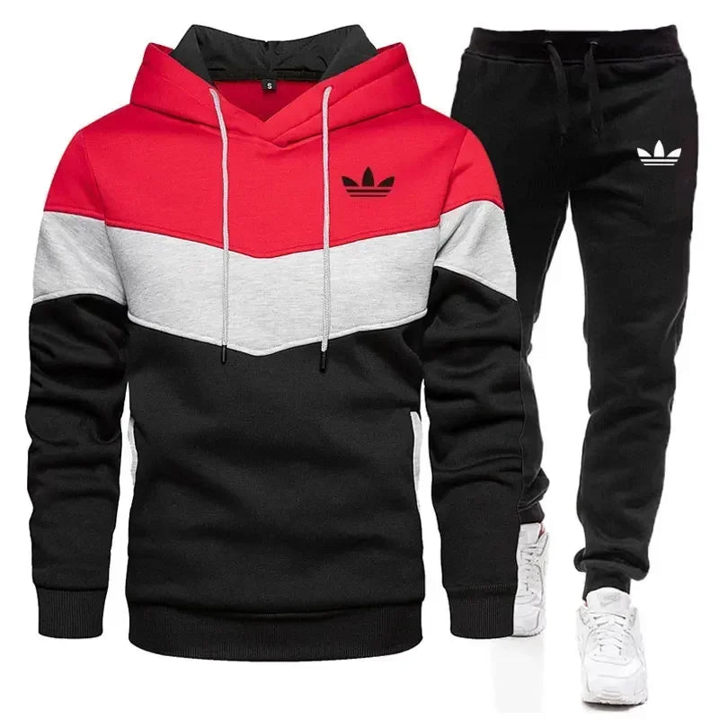 Adidas hoodie and pants set with red, black, and gray design on a white background