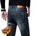 Person wearing blue jeans with a visible brand logo, holding a flame graphic with 'Warm Fleece' text.