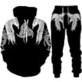 Black hoodie and pants with white tribal designs on a white background