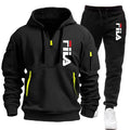 Black FILA hoodie and pants set with yellow accents on a white background