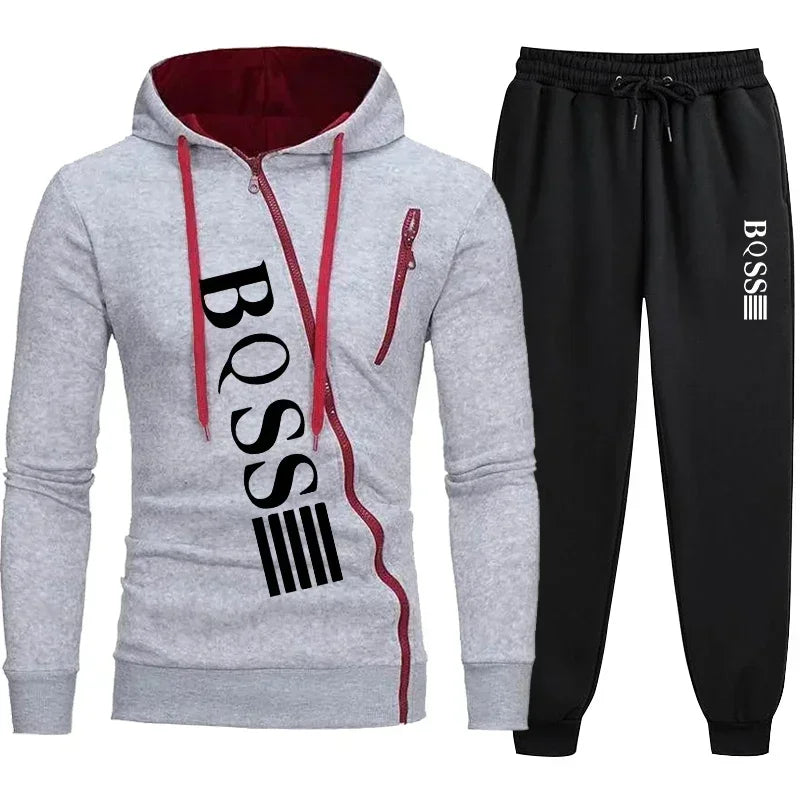 Gray hoodie with red drawstrings and black 'BOSS' logo, paired with black pants on a white background.
