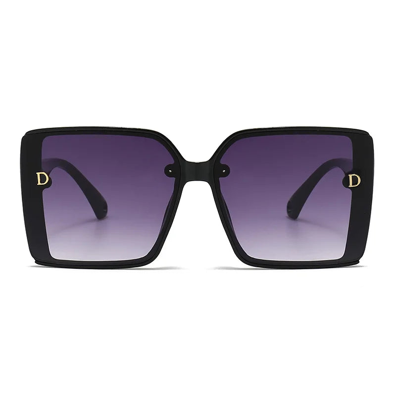 Black sunglasses with purple gradient lenses on a white background
