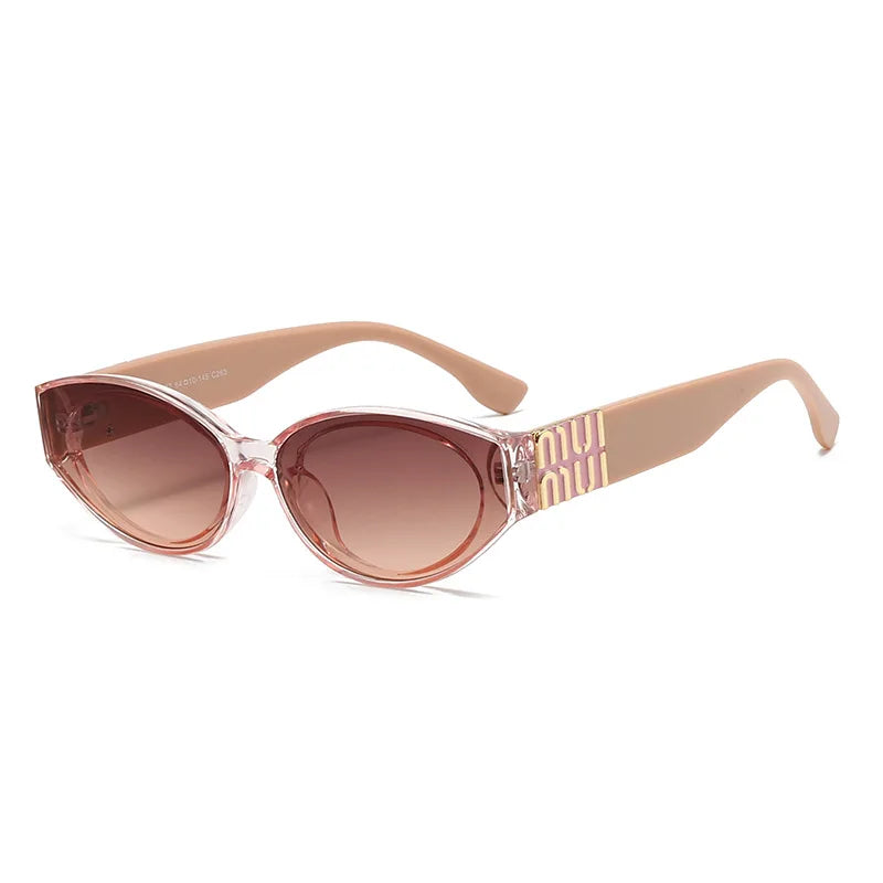 Sunglasses with pink frame and gradient lenses on a white background
