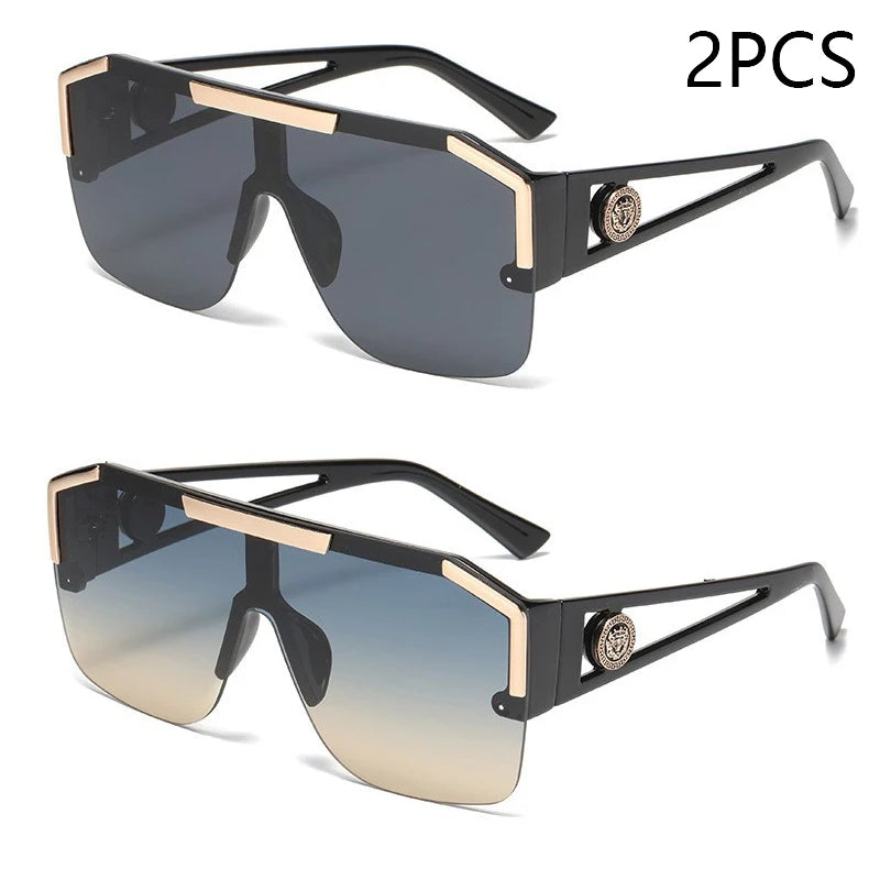 Two pairs of sunglasses with black and gold frames on a white background.