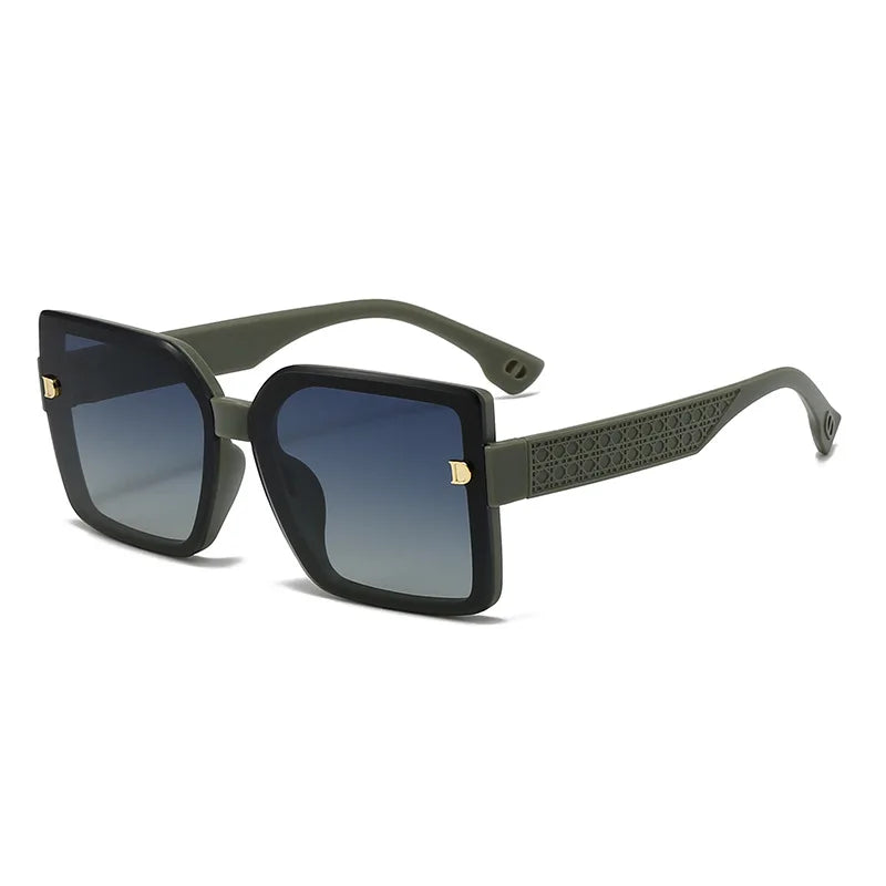 Sunglasses with green frame and black lenses on a white background