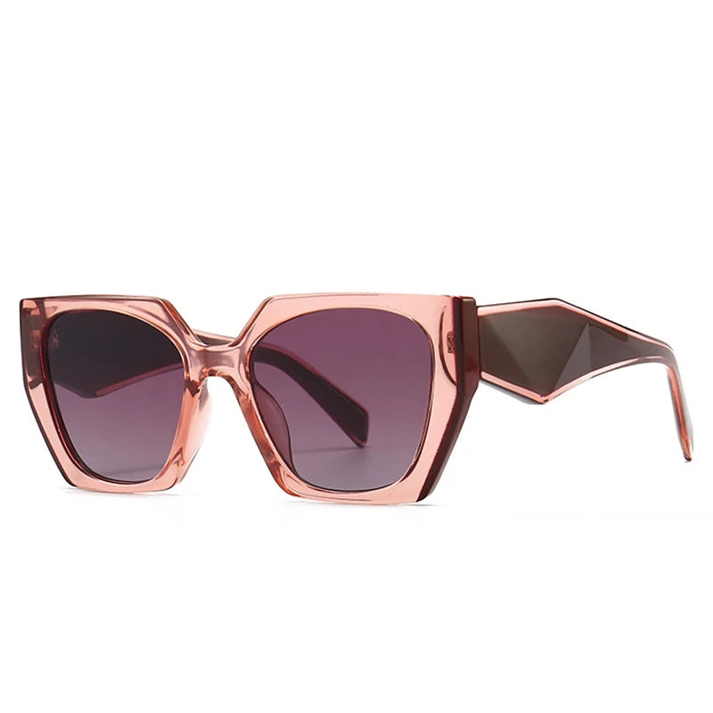 Sunglasses with a rose gold frame and dark lenses on a white background