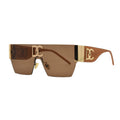 Sunglasses with gold accents and a logo on a white background