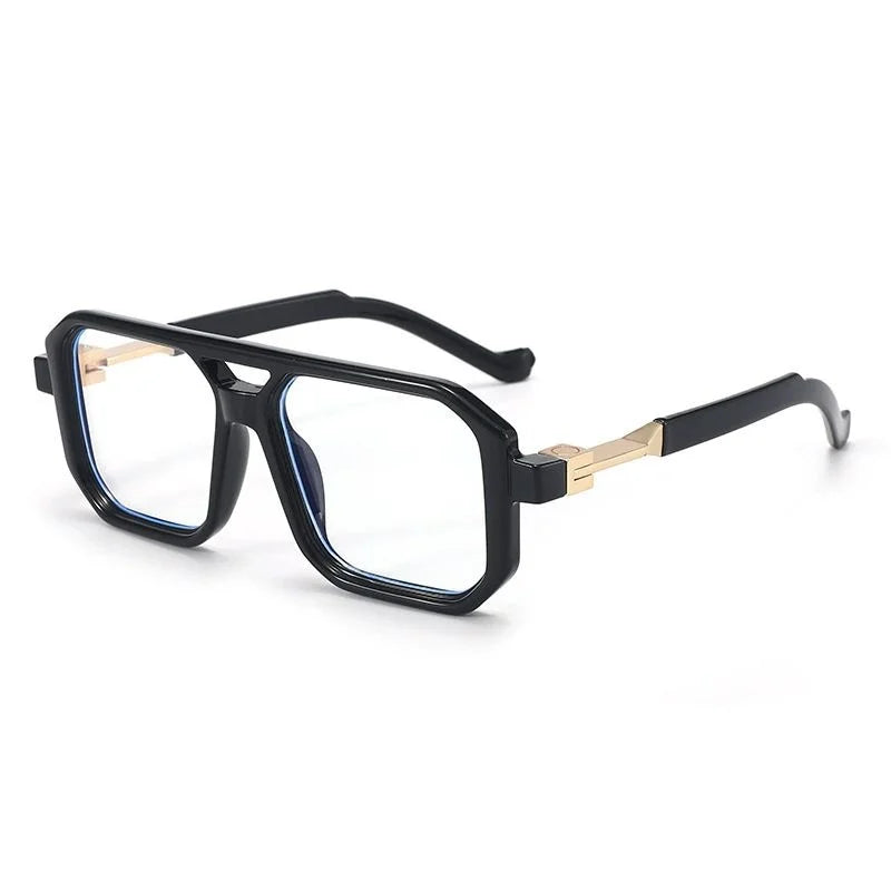 Black and gold eyeglasses on a white background