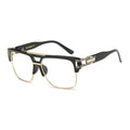 Black and gold eyeglasses on a white background