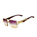 Sunglasses with gold frame and gradient lenses on a white background