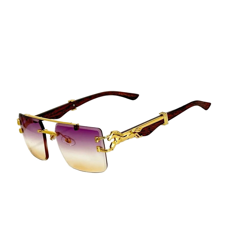 Sunglasses with gold frame and gradient lenses on a white background