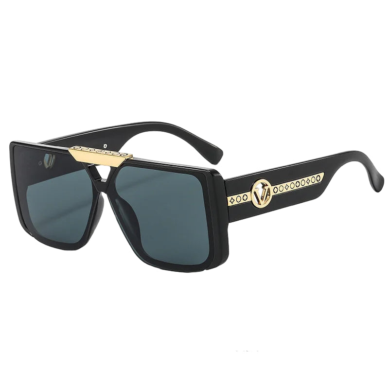 Black sunglasses with gold accents on a white background