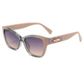 Sunglasses with a beige frame and purple gradient lenses on a white background