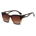 Sunglasses with brown lenses and black frame on a white background