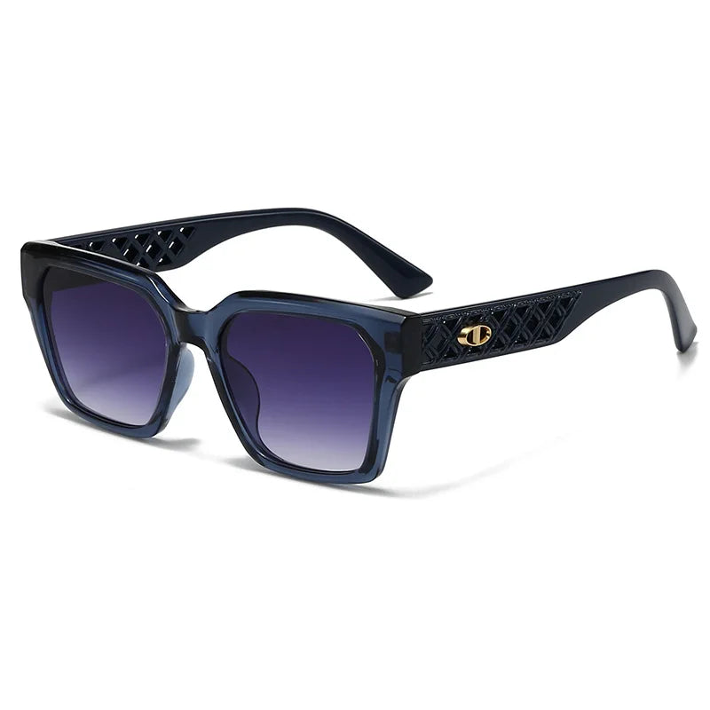 Blue sunglasses with intricate frame design on a white background