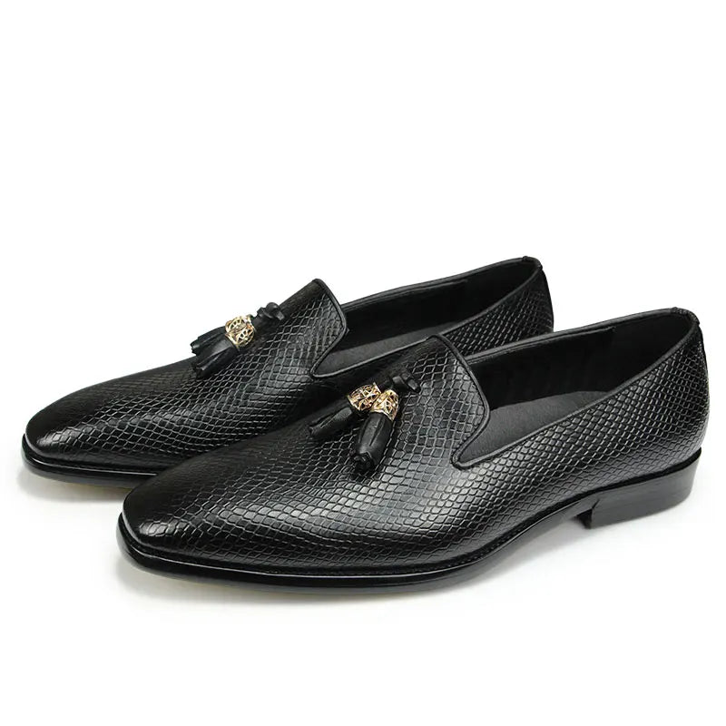 stylish men’s leather tassel loafers handmade in a white background
