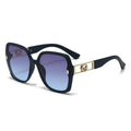 Sunglasses with black frame and blue gradient lenses on a white background
