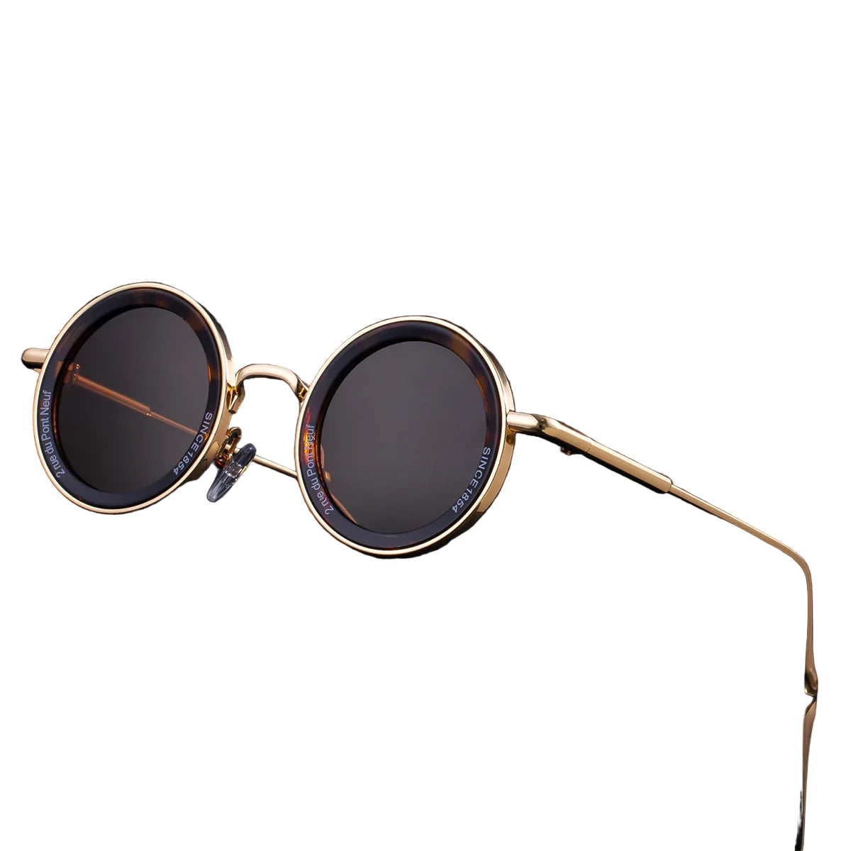 Round sunglasses with gold frame and dark lenses on a white background