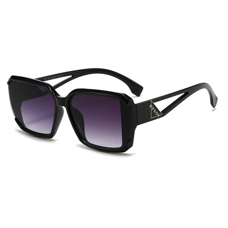 Black sunglasses with gradient lenses on a white background