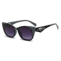 Black sunglasses with gradient lenses on a white background