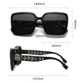Black sunglasses with measurements on a white background