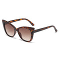 Tortoiseshell cat-eye sunglasses on a white background