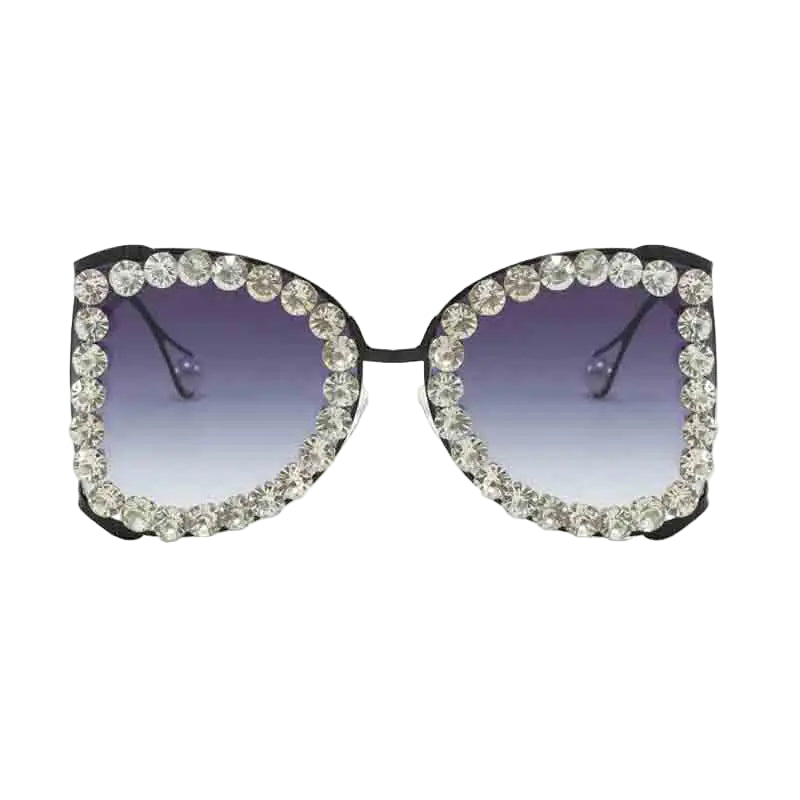 Sunglasses with crystal embellishments on a white background, featuring the brand 'DOHOHDO'.
