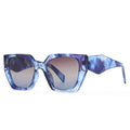 Blue sunglasses with a gradient lens on a white background