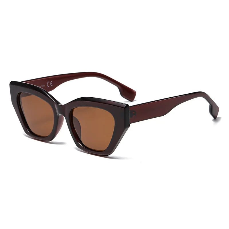 Brown sunglasses with a white background