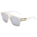 Sunglasses with gold frame and clear lenses on a white background