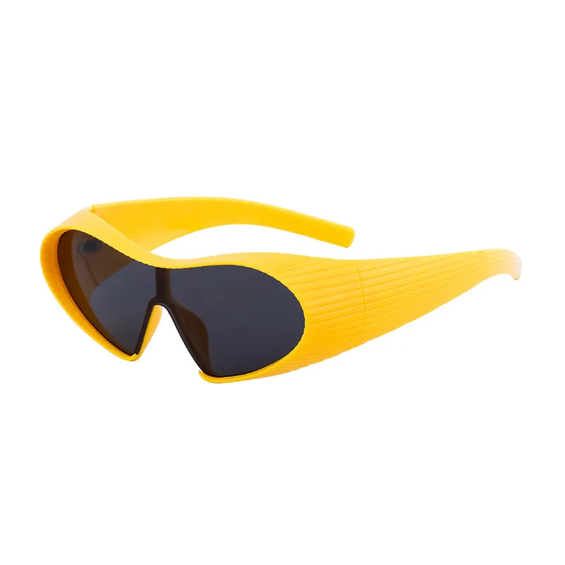 Yellow sunglasses with dark lenses on a white background