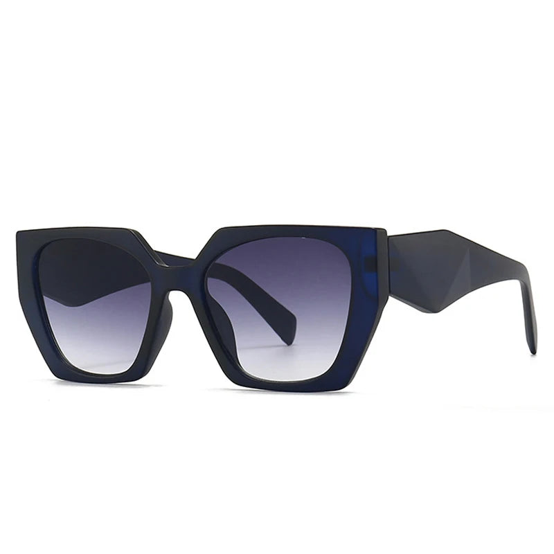 Blue sunglasses with gradient lenses on a white background