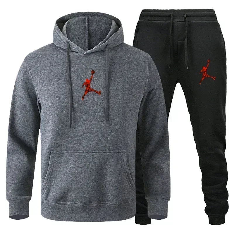 Gray hoodie and black jogger pants set with red logo on a white background