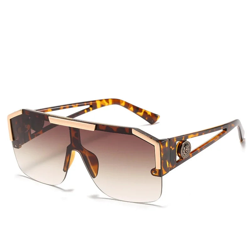 Sunglasses with tortoiseshell frame and gradient lenses on a white background