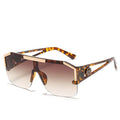 Sunglasses with tortoiseshell frame and gradient lenses on a white background