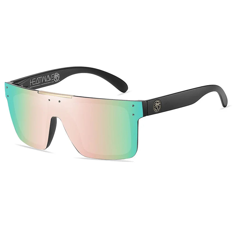 Sunglasses with a gradient green to pink lens on a white background