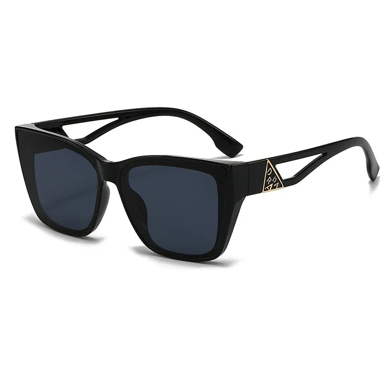 Black sunglasses with a brand logo on a white background
