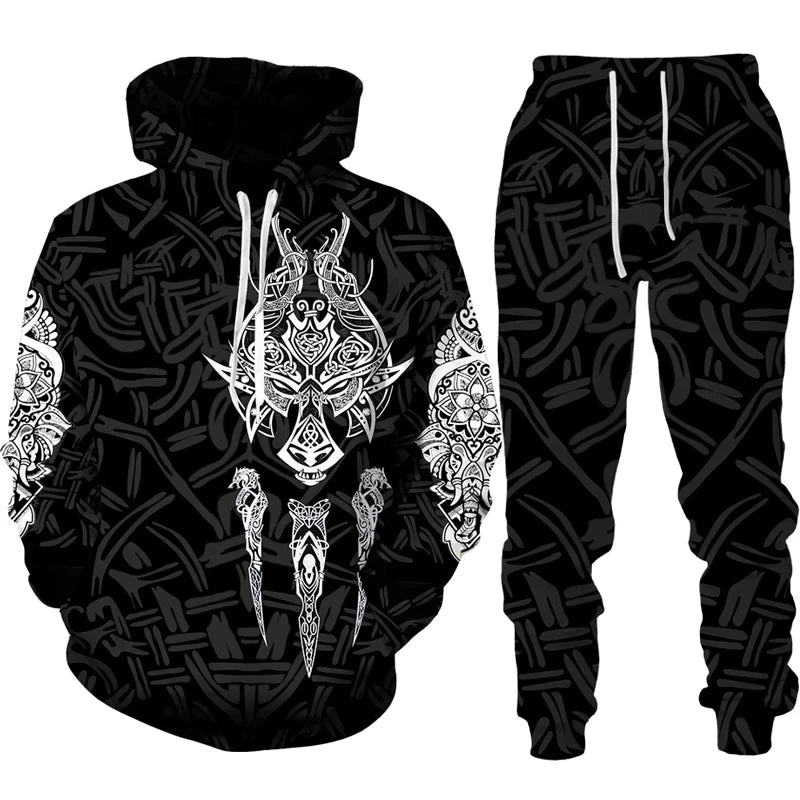 Black hoodie and pants set with intricate white designs on a white background