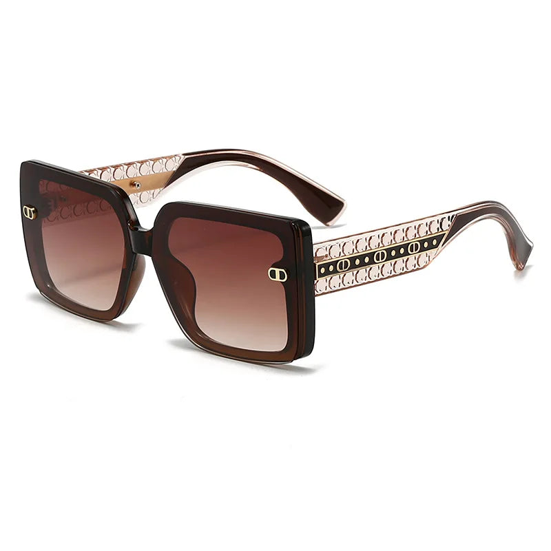 Sunglasses with decorative patterned arms on a white background